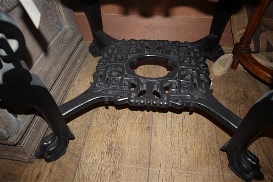 A Chinese carved ebonised occasional table W.58cm